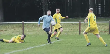  ??  ?? Ryhope Foresters (pale blue) push forward in last weekend’s draw at home to Wallsend Boys Club at Ryhope Recreation Ground, Sunderland.