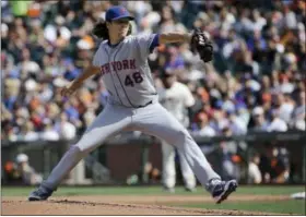  ?? JEFF CHIU — THE ASSOCIATED PRESS ?? Mets pitcher Jacob deGrom throws against the Giants during the first inning Saturday.