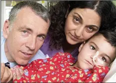  ??  ?? Recovery: Ashya with his parents Brett and Naghmeh