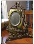  ?? (TNS) ?? This exuberant and uncommon piece — “Meriden Quadruple Silver Plate” — was likely intended to be a picture frame.