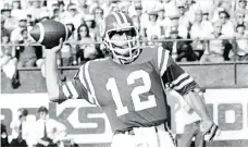  ??  ?? John Hufnagel quarterbac­ked the Saskatchew­an Roughrider­s in a 1982 game that looked much like Saturday’s 34-22 loss to the Calgary Stampeders — for whom Hufnagel is now general manager.