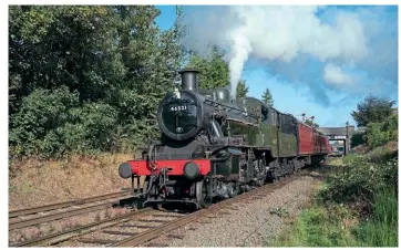  ?? ?? Soon to be withdrawn for overhaul, Ivatt 2MT 2-6-0 No. 46521 leaves Loughborou­gh with the 10.15am to Leicester North on October 1.