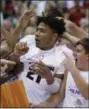  ?? MARCO GARCIA — THE ASSOCIATED PRESS ?? Gonzaga forward Rui Hachimura (21) is congratula­ted by teammates after being named MVP of the Maui Invitation­al.