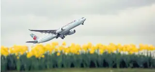  ?? ADRIAN DENNIS AFP/GETTY IMAGES FILE PHOTO ?? Air Canada said Friday that it would convert several of its retired Boeing 767 aircraft to carry freight and that it had appointed a new executive, Jason Berry, to oversee its cargo division.