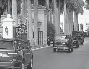  ?? PATRICK SEMANSKY/ AP ?? President Donald Trump’s motorcade arrives at Trump Internatio­nal Golf Club in West Palm Beach on Christmas Eve.