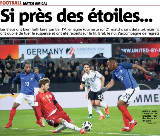  ?? (Photo AFP) ?? Martial pour Lacazette : le premier but des Bleus est un bijou.