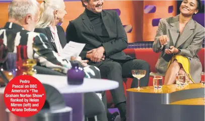  ?? ?? Pedro Pascal on BBC America’s “The Graham Norton Show” flanked by Helen Mirren (left) and Ariana DeBose.