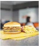  ?? (Courtesy Photo/Whataburge­r) ?? A Whataburge­r restaurant opened this past Wednesday at 529 Tina St. in Van Buren. A chili cheeseburg­er and fries are shown.