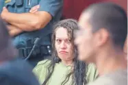  ?? EDDIE MOORE/JOURNAL ?? Tracy Ann Pena, center, sits in court with Jordan Nunez, right, during a detention hearing on Sept. 5. Both are being held on charges related to the death of Pena’s 13-year old son, Jeremiah Valencia.