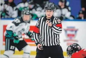  ?? CANADIAN PRESS FILE PHOTO ?? Referee Erica Holmes feels she’s hit the glass ceiling as a hockey official in Alberta, echoing concerns by a female counterpar­t that she can’t advance to higher levels in the men’s game.