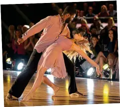  ??  ?? Hit: Evanna Lynch and Keo Motsepe on DWTS in the US