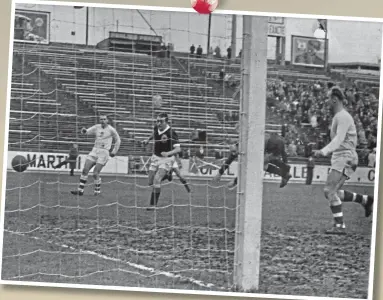  ??  ?? Ian St John scores Scotland’s second in Brussels, but it was not enough to get to Chile