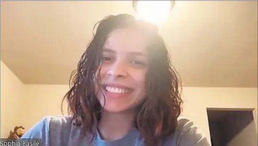  ?? Bryan Proctor / Screenshot ?? Sophia Basile on Zoom talks about her virtual learning experience. A sophomore law major at Suffolk University in Boston, she is now taking her classes online from her dad’s house in Alpharetta, Ga.