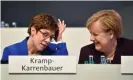  ?? Photograph: Matthias Rietschel/ Reuters ?? Kramp-Karrenbaue­r with Merkel at the conference.