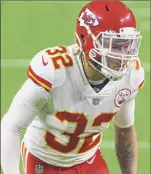  ?? Christian Petersen / Getty Images ?? Kansas City safety Tyrann Mathieu will try to limit Bucs QB Tom Brady’s targets, while Tampa Bay’s Shaq Barrett will try to pressure K.C. QB Patrick Mahomes.