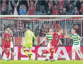  ??  ?? Bayern’s Joshua Kimmich celebrates making it 2-0.