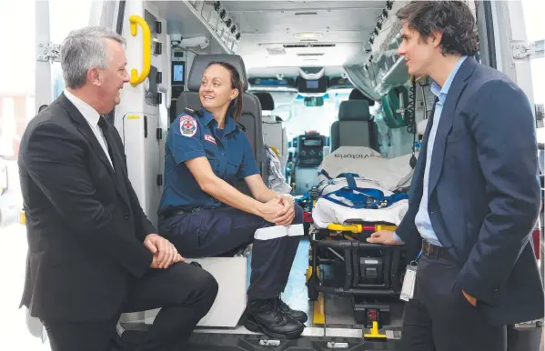  ?? Picture: ALISON WYND ?? HELPING OUT: Minister Martin Foley, paramedic Belinda Haddon and Barwon Health’s Steve Moylan at the announceme­nt of the PROMPT extension.