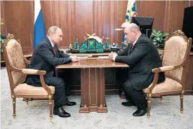  ?? Photo / AP ?? Vladimir Putin and new Russian Prime Minister Mikhail Mishustin.