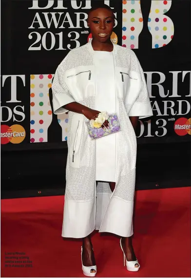  ??  ?? Laura Mvula wearing a long white coat at the Brit Awards 2013.