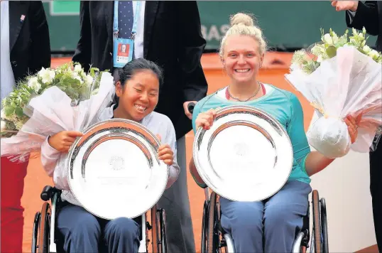  ??  ?? n SMILES ALL ROUND: Jordanne Whiley (right) and Yiu Kamiji with their Roland Garros titles; (below) in action during the final