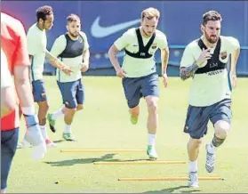  ?? FOTO: FCB ?? Intensidad tras dos días descanso Messi y Rakitic aprietan de cara a la final de Copa