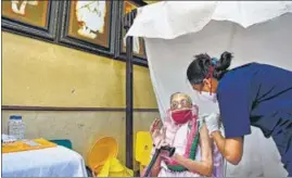  ?? PTI ?? An elderly woman gets inoculated against Covid, at a vaccinatio­n centre in Mumbai on Monday.