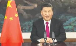  ?? WORLD ECONOMIC FORUM (WEF) / AFP VIA GETTY IMAGES FILES ?? President Xi Jinping is walking a line of trying to ease income inequality while not stifling initiative. “We cannot support layabouts,” a top Chinese official said.