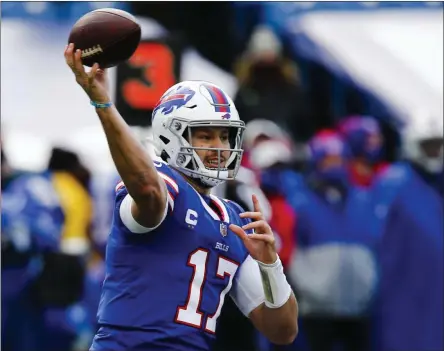  ?? JOHN MUNSON - THE ASSOCIATED PRESS ?? FILE - In this Nov. 1, 2020, file photo, Buffalo Bills quarterbac­k Josh Allen (17) throws a pass during the first half of an NFL football game against the New England Patriots in Orchard Park, N.Y. Allen and the AFC East-leading Bills prepare to host the rookie Justin Herbert-led Chargers on Sunday in a showdown of the NFL’s two leaders in yards passing.