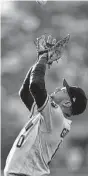  ?? ?? Ron Schwane/Associated Press Yuli Gurriel makes a catch during Saturday’s loss to the Guardians.