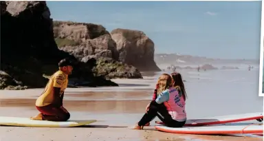  ?? ?? Test the water: A surf lesson on Three Mile Beach in north Cornwall. Inset: Ice bath therapy