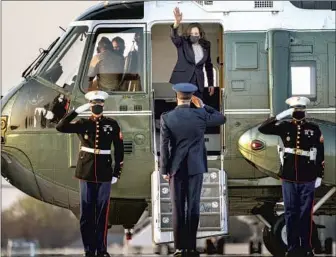  ?? KENT NISHIMURA Los Angeles Times ?? VICE PRESIDENT Kamala Harris waves at Andrews Air Force Base. Harris has played a key role in the administra­tion’s first 100 days and has the same job approval rating — 53% — as the president.