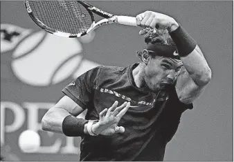  ?? [ANDRES KUDACKI/THE ASSOCIATED PRESS] ?? Top-seeded Rafael Nadal overpowere­d No. 24 seed Juan Martin del Potro 4-6, 6-0, 6-3, 6-2 to advance to the US Open men’s championsh­ip match.