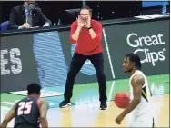  ?? Mark Humphrey / Associated Press ?? Hartford coach John Gallagher yells to his players during the second half against Baylor in the first round of the NCAA tournament at Lucas Oil Stadium in March in Indianapol­is.