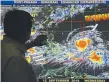  ?? Picture: AP ?? Filipino forecaster Meno Mendoza shows the path of Typhoon Mangkhut,