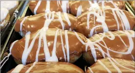  ?? PHOTO BY EMILY RYAN ?? Beiler’s caramel apple doughnuts won’t disappoint.