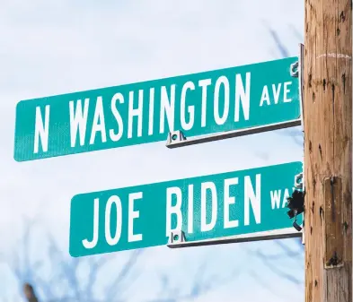  ?? CHRISTOPHE­R DOLAN/THETIMES-TRIBUNE, ?? Scranton renamed a street in honor of native son President-elect Joe Biden. SCRANTON