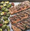  ?? CONTRIBUTE­D BY AMERICAN PECAN COUNCIL ?? Sheet Pan Pecan-Crusted Salmon With Brussels Sprouts only takes about 20 minutes to prepare.