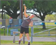  ??  ?? Tank competes in the shot put as part of the Pentathlon at a Special Olympics track meet in Rosenburg, Texas, in 2017. Special Olympics changed everything for Tank. He blossomed into a leader, spreading love an inspiratio­n to everyone he met.