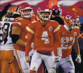  ?? CHARLIE RIEDEL — THE ASSOCIATED PRESS ?? Kansas City Chiefs backup quarterbac­k Chad Henne celebrates after a run during the second half of the NFL divisional playoff game against the Cleveland Browns on Sunday.