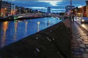  ?? CHRIS RATCLIFFE / BLOOMBERG 2016 ?? The River Liffey flows in Dublin. The EU and U.K. plan separate talks about the Irish border.