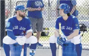  ?? FRANK GUNN/ THE CANADIAN PRESS ?? Randall Grichuk, right, says he’s looking forward to having Kevin Pillar patrol centre field beside him.