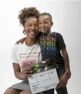  ?? Lily LaRegina/Post-Gazette ?? Mariah Torres, 27, of McKeesport, and her son Miliano McDaniel, 5, on Monday at Cut and Run Studios in Beechview. The filmmaker is producing a comedy series called “Rock Bottom” based on her experience­s with homelessne­ss while living in New York City.