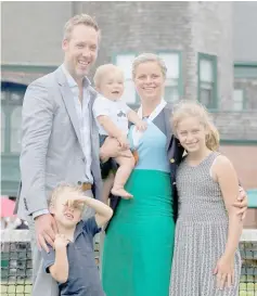  ??  ?? Kim Clijsters of Belgium and her family pose for a photograph after she was inducted into the Internatio­nal Tennis Hall of Fame in Newport, Rhode Island, July 22, 2017 file photo. — Reuters photo