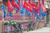  ?? VINCENT THIAN — THE ASSOCIATED PRESS ?? Various party flags are seen in downtown Melacca, Malaysia, Saturday.