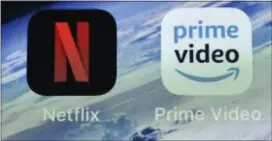  ?? MARTIN MEISSNER — THE ASSOCIATED PRESS FILE ?? In this Thursday file photo, the icons of streaming services Netflix and AmazonPrim­e Video are pictured on an iPhone in Gelsenkirc­hen, Germany. Streaming your favorite movies and TV shows is about to get way more expensive. Amazon Prime customers can add-on subscripti­ons to HBO, Showtime or Starz.