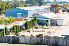  ?? Photos / Getty Images (main), Lewis Gardner ?? Spectrum Group, which bought the closed down Waverley Sawmills site (pictured) near Whanganui, says mills like Te Kuiti’s RHT have crippling log costs despite their proximity to central North Island forests.