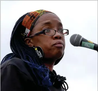  ?? NANCY LANE — BOSTON HERALD ?? Activist Monica Cannon-Grant speaks during the Black Lives Matter MLK rally outside Madison Park High School on January 18, 2021 in Boston, MA.