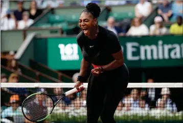  ?? ASSOCIATED PRESS ?? SERENA WILLIAMS of the U.S. clenches her fist after scoring a point against Krystina Pliskova of the Czech Republic during their first round match of the French Open tennis tournament at the Roland Garros stadium in Paris, France, Tuesday.