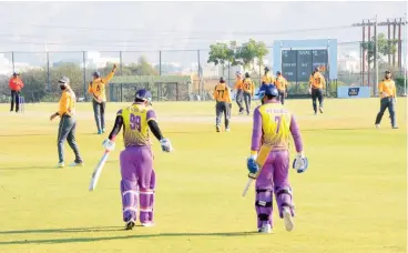  ??  ?? A file photo of 2020-21 A Division T20 league match between Basta CT and EY at the Oman Cricket ground in Al Amerat