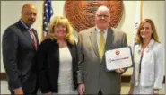  ?? SUBMITTED PHOTO ?? Chester County Commission­ers Michelle Kichline, right, and Terence Farrell, left, receive the American Diabetes Associatio­n Health Champions Award from Dr. Kevin Kelly, Area Executive Director for the organizati­on, center right. Also pictured, Marcy...